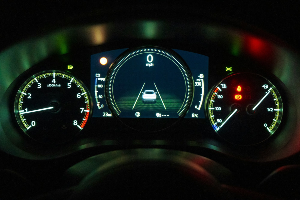 Illuminated car dashboard instrument cluster