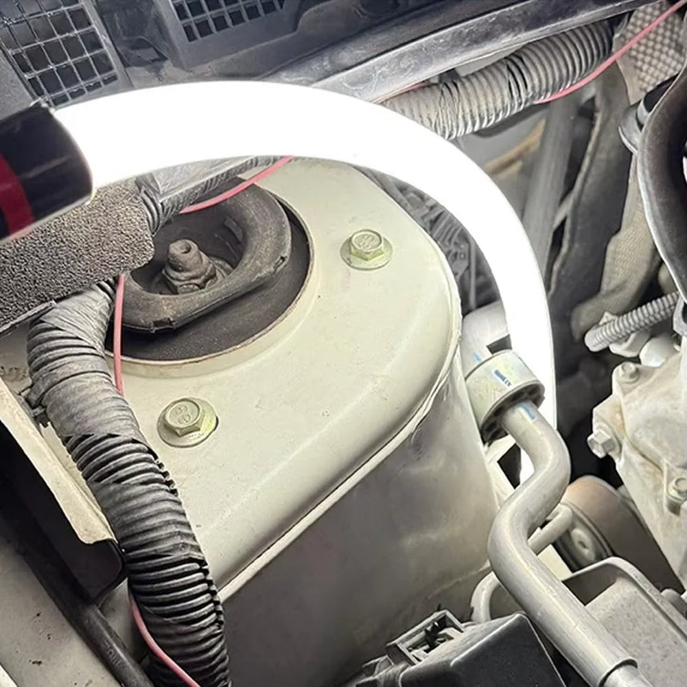 Light wrapped around parts in a tight engine bay