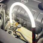 Flexible light bent into an engine bay