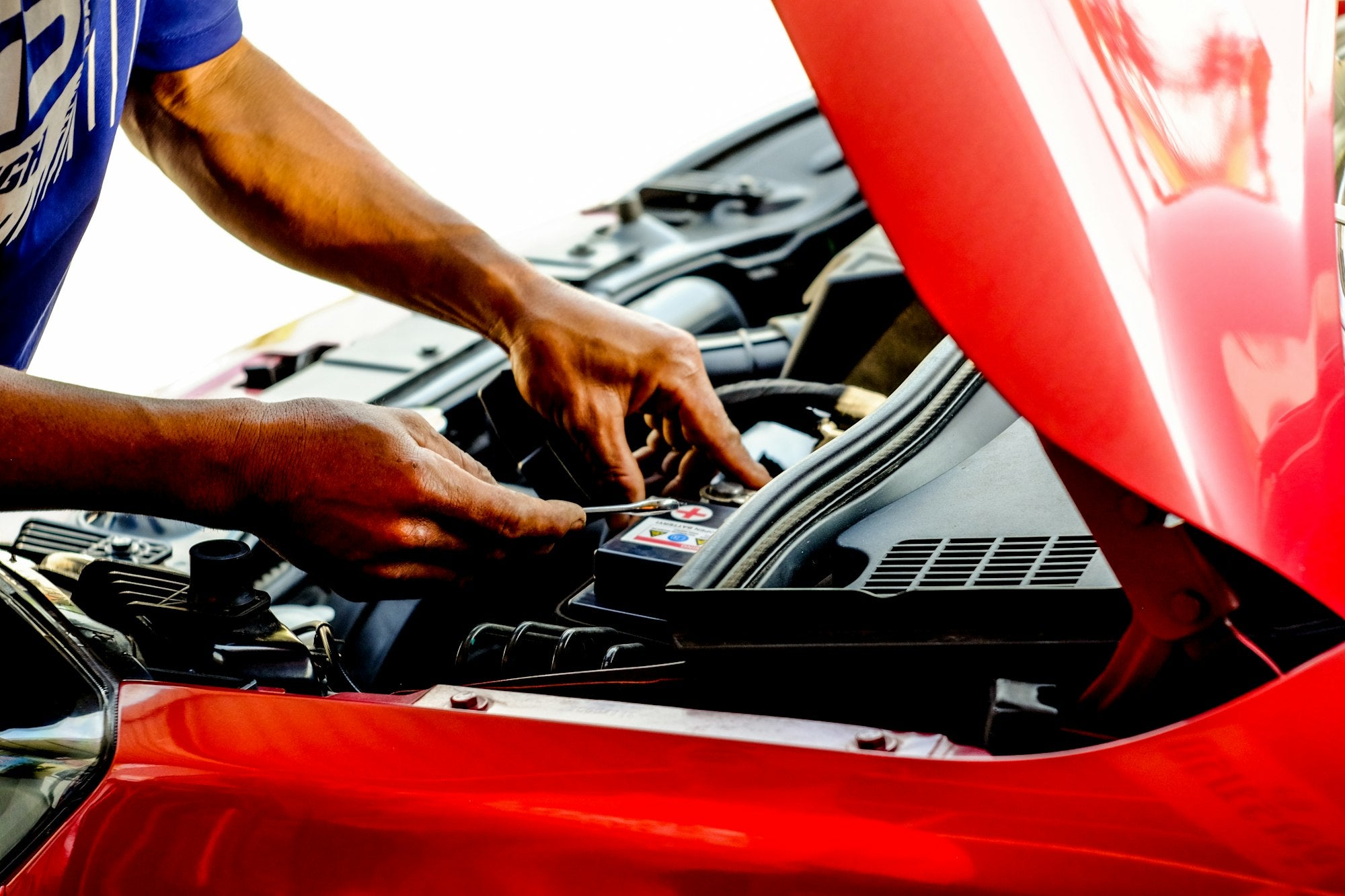 GarageBit story - home mechanic fixing a car in daylight